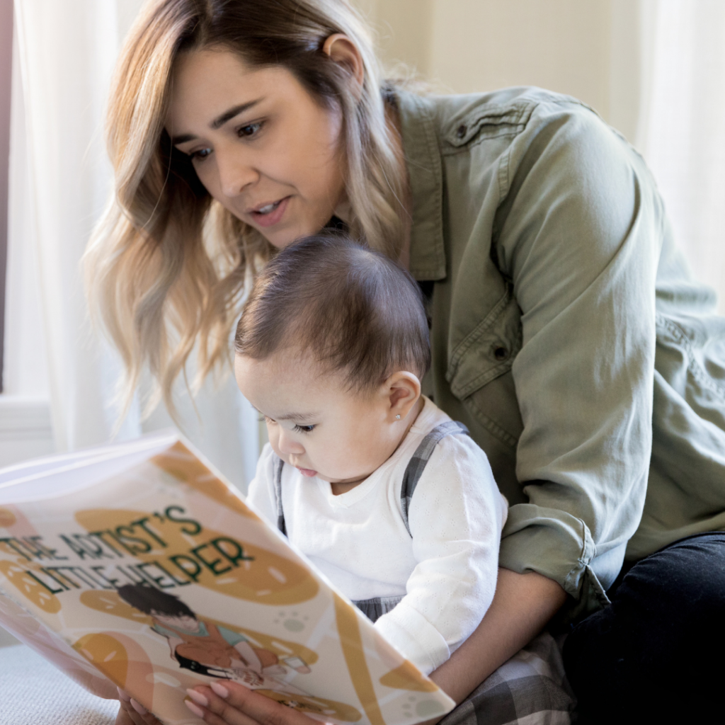 stay at home mom reading to baby